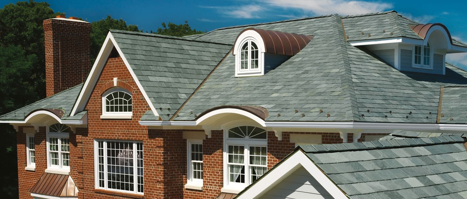Premium slate roof installed by EZ Roofing on a Springfield, MO home